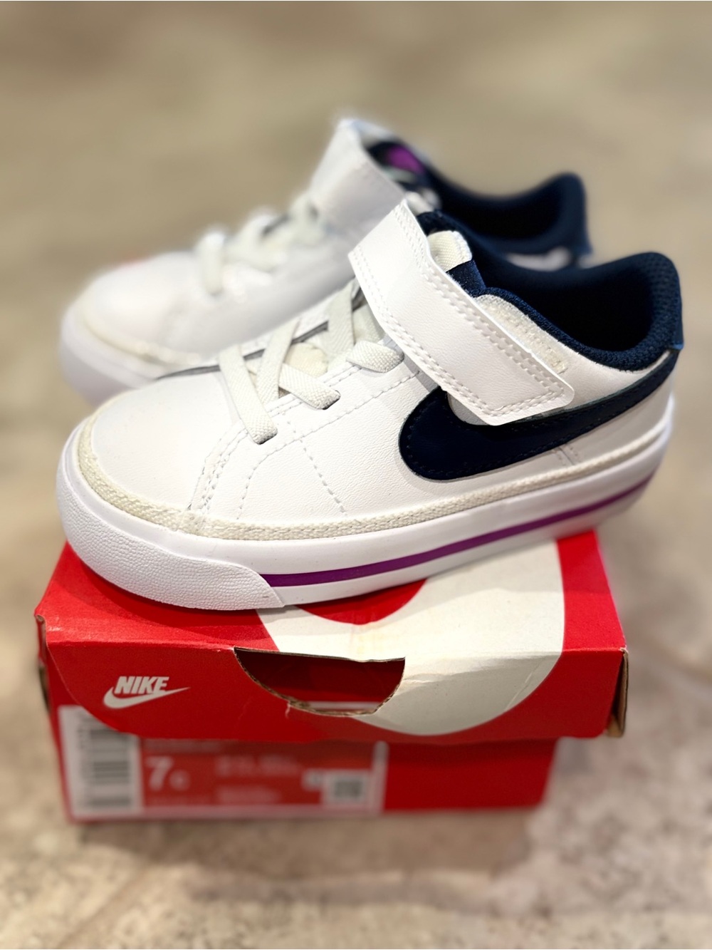 Nike Kids White Sneakers with Navy and Purple Accent